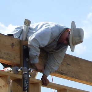 Steel plates to secure beams to posts