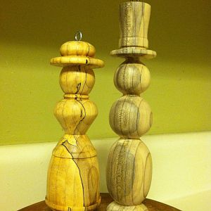 The Magnolia Spalted Snowman and Lady Ornaments