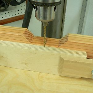 Slotted fence hold-down.