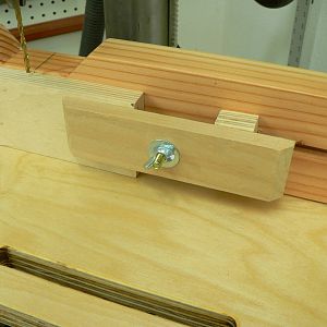 Slotted fence hold-down.