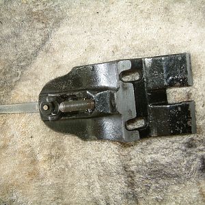 Frog with depth adjuster screw