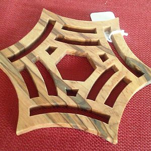 Trivet and doubles as spider web