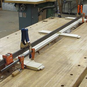 Assemblying center rib for frame & panel assembly