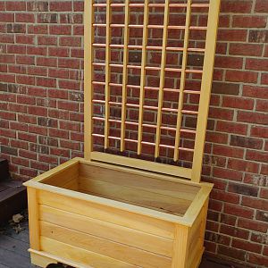 Planter with copper tubing trellis