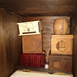 050_Contents of secret area behind panel.jpg