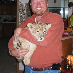 Scott with lion cub