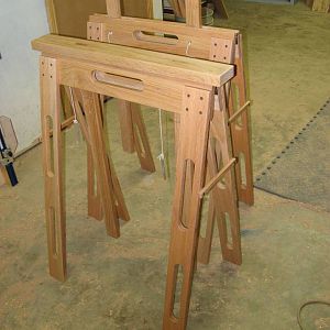 Adjustable-height folding sawhorses