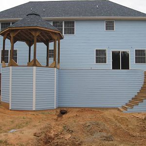 Deck with circular stairs and gazebo