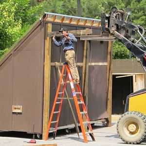 Installing skids on side of kiln