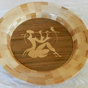 Segmented bowl with inlay