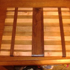 maple walnut and cherry cutting board