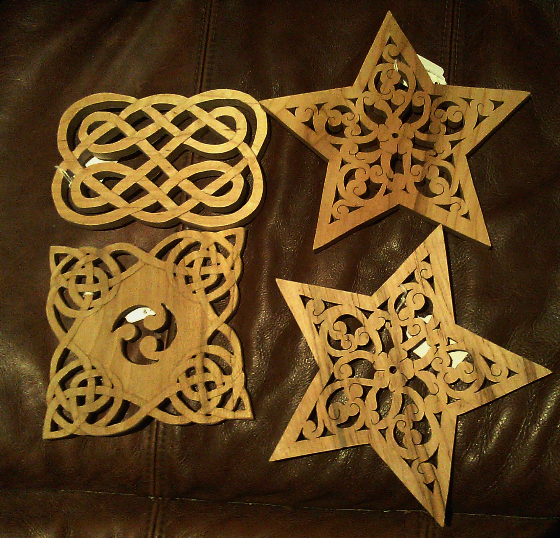 2 star trivets and 2 celtic ones