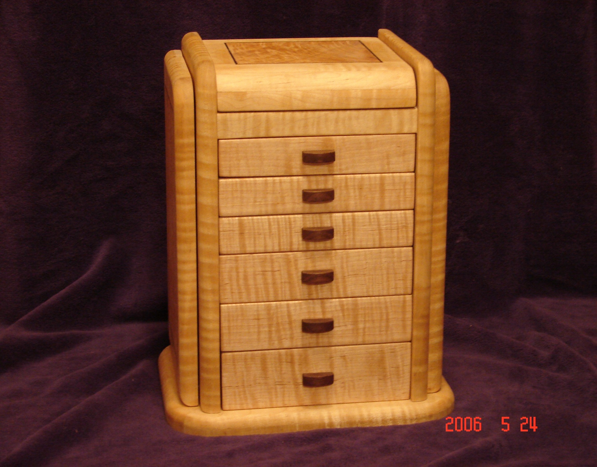 Curly Maple jewelry box with quilted Maple veneer and Walnut